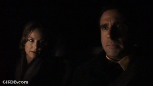 A Man And A Woman In A Dark Room With The Words I Feel Like It But I Am Not Going To Below Them GIF