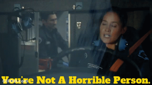 A Man And A Woman In An Ambulance With The Words You 'Re Not A Horrible Person GIF