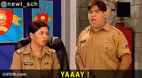 A Man And A Woman In Police Uniforms Are Standing Next To Each Other In A Room With The Words Yaaay Written Above Them GIF