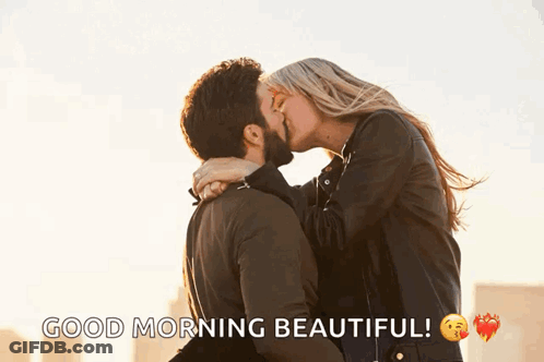 A Man And A Woman Kissing With The Words " Good Morning Beautiful " Below Them GIF