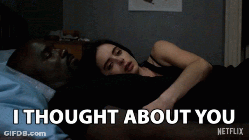 A Man And A Woman Laying In Bed With The Words " I Thought About You " On The Bottom GIF