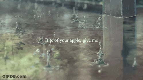 A Man And A Woman Sit On A Bench Under A Tree With An Umbrella GIF