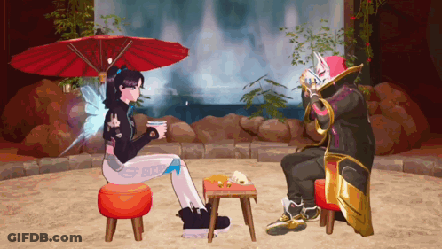 A Man And A Woman Sitting Under An Umbrella GIF
