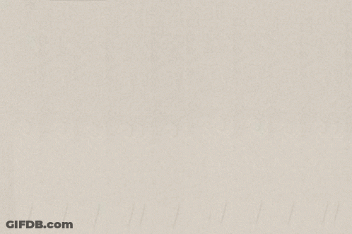 A Man And A Woman Standing Next To Each Other GIF