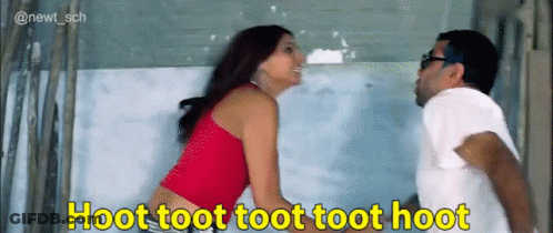 A Man And A Woman Standing Next To Each Other With A Caption That Says Hoot Toot Toot Toot Toot GIF