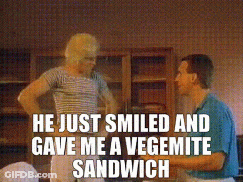 A Man And A Woman Standing Next To Each Other With The Caption He Just Smiled And Gave Me A Vegemite Sandwich .. GIF