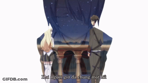A Man And A Woman Standing Next To Each Other With The Words Hai Người Giờ Đã Chung Một Lời Below Them GIF