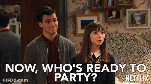 A Man And A Woman Standing Next To Each Other With The Words Now Who 'S Ready To Party On The Bottom GIF