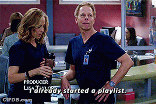 A Man And A Woman Standing Next To Each Other With The Words Producer Lisa Taylor Already Started A Playlist Below Them GIF