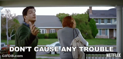 A Man And A Woman Standing On A Porch With The Words " Don 'T Cause Any Trouble " Written On The Bottom GIF