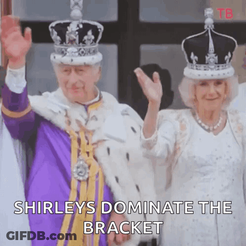 A Man And A Woman Wearing Crowns Are Standing Next To Each Other And Waving . GIF
