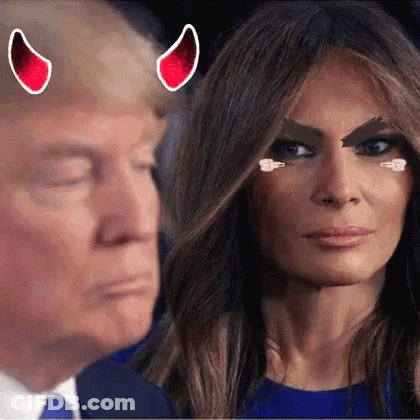A Man And A Woman With Devil Horns On Their Faces Are Looking At Each Other . GIF