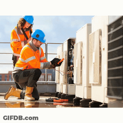 A Man And A Woman Working On A Building GIF
