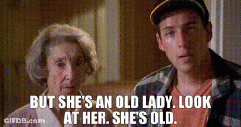 A Man And An Elderly Woman Are Standing Next To Each Other And The Woman Says But She 'S An Old Lady Look At Her GIF