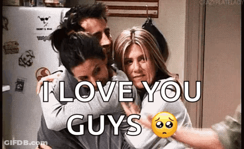 A Man And Two Women Hugging Each Other With The Words `` I Love You Guys '' . GIF