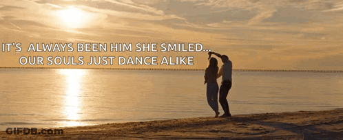 A Man And Woman Are Dancing On The Beach With A Quote That Says It 'S Always Been Him She Smiled GIF