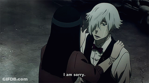 A Man And Woman Are Hugging And The Man Is Saying I Am Sorry GIF