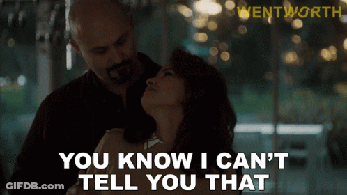 A Man And Woman Are Hugging And The Man Is Saying " You Know I Can 'T Tell You That " GIF