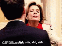 A Man And Woman Are Hugging And The Woman Says Shh Shh Shh Shh GIF