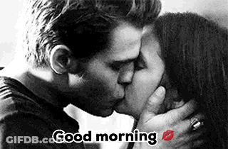 A Man And Woman Are Kissing In A Black And White Photo With The Words `` Good Morning '' . GIF