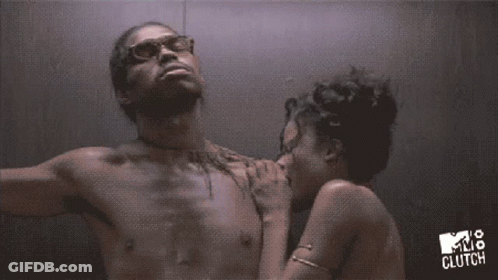 A Man And Woman Are Kissing In An Elevator With The Words Mtv Clutch On The Bottom Right GIF