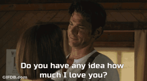 A Man And Woman Are Looking Into Each Other 'S Eyes With The Words Do You Have Any Idea How Much I Love You Below Them GIF