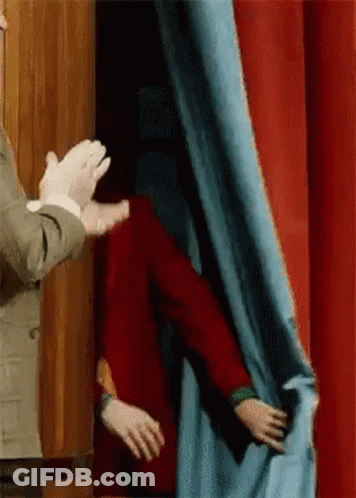Man And Woman Clapping Behind Blue Curtain GIF