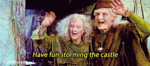A Man And Woman Are Standing Next To Each Other With The Words `` Have Fun Storming The Castle '' Above Them . GIF