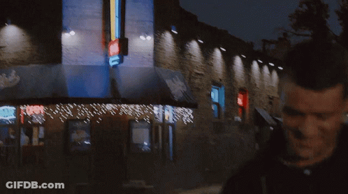 A Man And Woman Are Walking Down A Street And The Man Says I 'M Sorry To Take You Away GIF