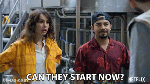 Man And Woman Standing With Can They Start Now GIF