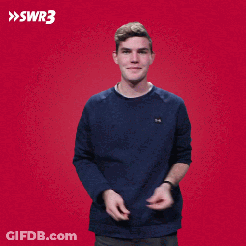 A Man Applauds In Front Of A Red Background That Says Swr3 On It GIF