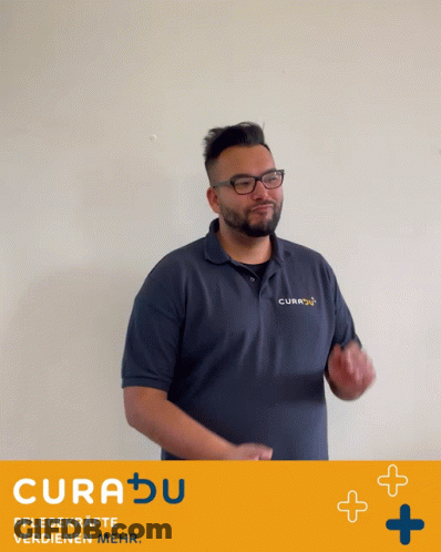 A Man Applauds In Front Of A Sign That Says Curadu Pflegekrafte Verdienen Mehr GIF