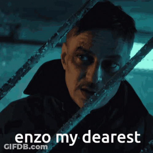 A Man Behind Bars With The Words Enzo My Dearest Written Below Him GIF