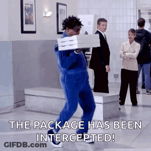 A Man Carrying A Box Of Pizza With The Words The Package Has Been Intercepted GIF
