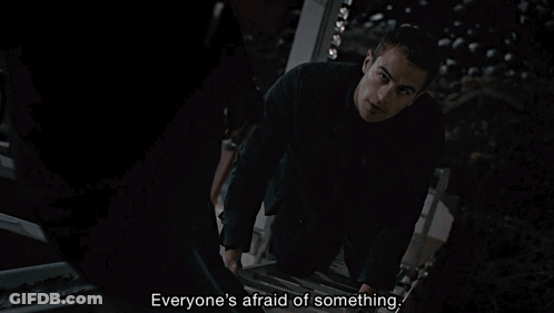 A Man Climbs A Set Of Stairs And Says Everyone 'S Afraid Of Something . GIF