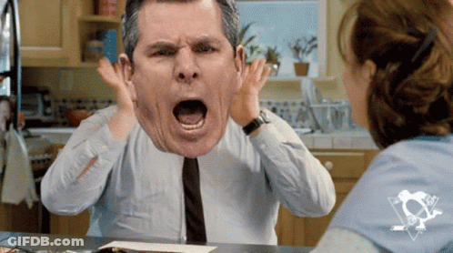 A Man Covering His Ears With His Hands While A Woman Watches GIF