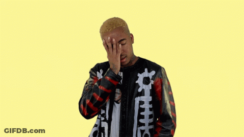 A Man Covering His Face With His Hand And Wearing A Jacket That Says ' Supreme ' On It GIF
