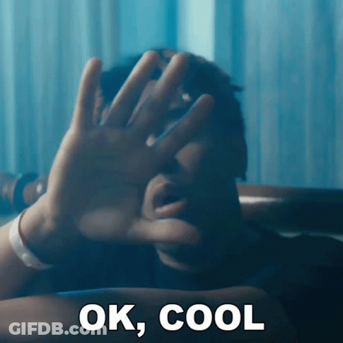A Man Covering His Face With His Hands And The Words Ok Cool Below GIF