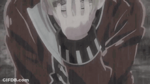 A Man Covering His Face With His Hands In A Cartoon GIF