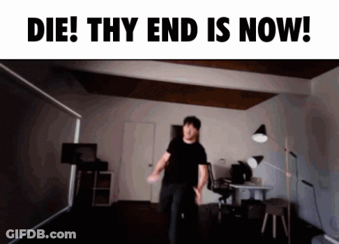 A Man Dancing In A Room With The Words Die Thy End Is Now GIF