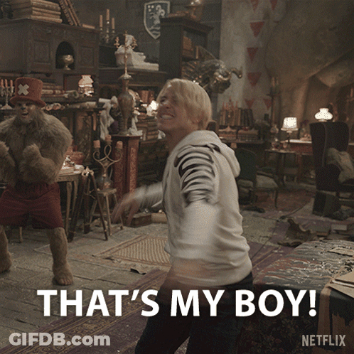 A Man Dancing In A Room With The Words That 'S My Boy GIF