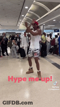 A Man Dancing In An Airport With The Words Hype Me Up GIF