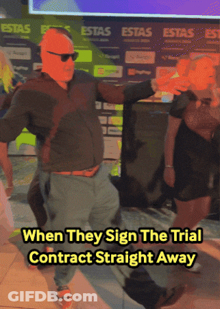 A Man Dancing In Front Of A Sign That Says " Estas " GIF