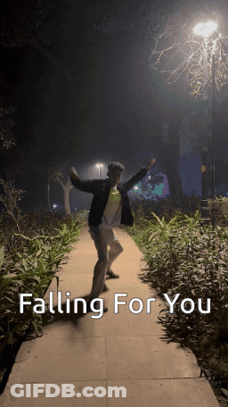 A Man Dancing On A Path With The Words Falling For You GIF
