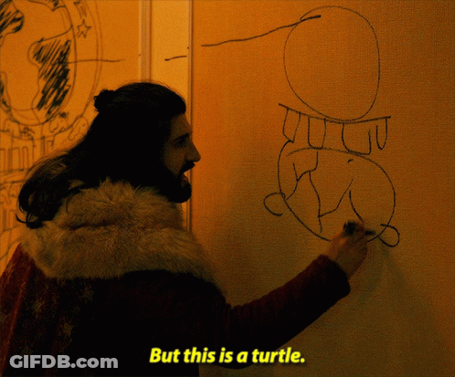 A Man Drawing A Turtle On A Wall With The Words But This Is A Turtle Below Him GIF