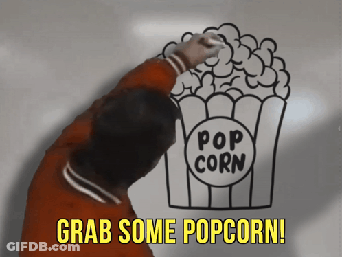 A Man Draws A Picture Of A Popcorn Bucket With The Words Grab Some Popcorn Below It GIF