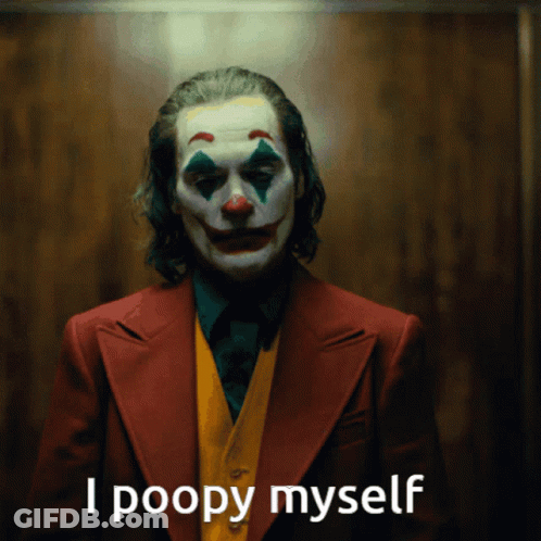 A Man Dressed As A Clown With The Words I Poopy Myself Below Him GIF