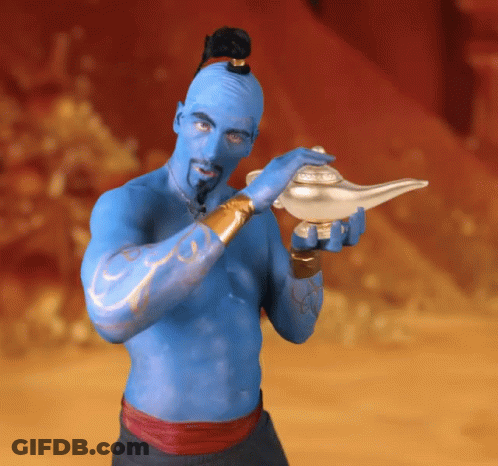 A Man Dressed As A Genie Holds A Lamp GIF