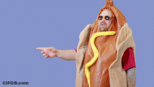 A Man Dressed As A Hot Dog With The Words You Know It Above Him GIF