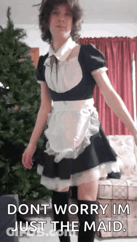 A Man Dressed As A Maid With The Words " Dont Worry Im Just The Maid " GIF